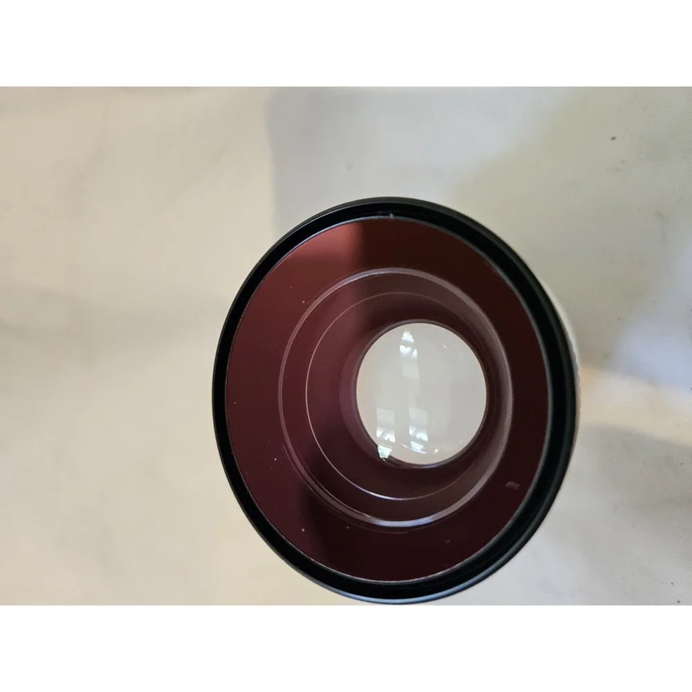Wide angle lens made in Japan,‎ listed with Both Lens caps